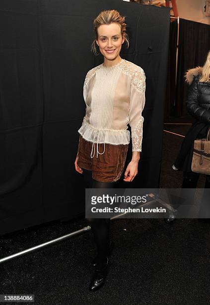 Actress Taylor Schilling poses backstage at the Jenny Packham Fall 2012 fashion show during Mercedes-Benz Fashion Week at The Studio at Lincoln...