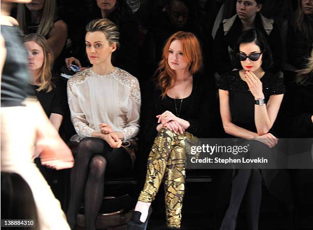 Actress Taylor Schilling, actress Kaylee DeFer and Dita Von Teese attend the Jenny Packham Fall 2012 fashion show during Mercedes-Benz Fashion Week...