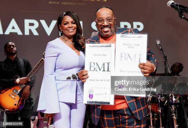 Marvin Sapp accepts an award from BMI Vice President Catherine Brewton onstage during the BMI's 2022 Trailblazers of Gospel Music Awards on March 31,...