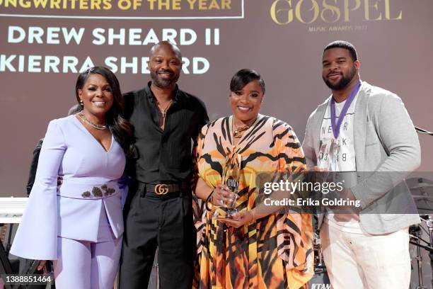 Vice President Catherine Brewton, BMI AVP Creative Los Angeles Wardell Malloy, Kierra Sheard and J. Drew Sheard II pose for a photo onstage during...