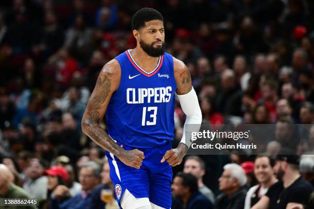 Paul George of the Los Angeles Clippers reacts after making a three point basket in the first half against the Chicago Bulls at United Center on...