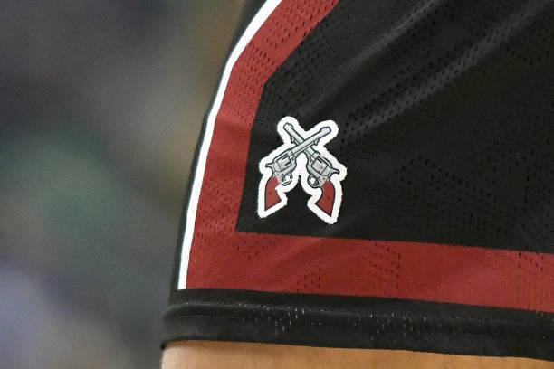 The New Mexico State Aggies logo on a pair of shorts during their 2022 NCAA Men's Basketball Tournament first round game against Connecticut...