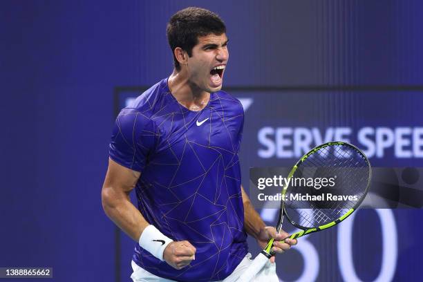 Carlos Alcaraz of Spain celebrates a point in his Men's quarterfinal match against Miomir Kecmanovic of Serbia during the Miami Open at Hard Rock...