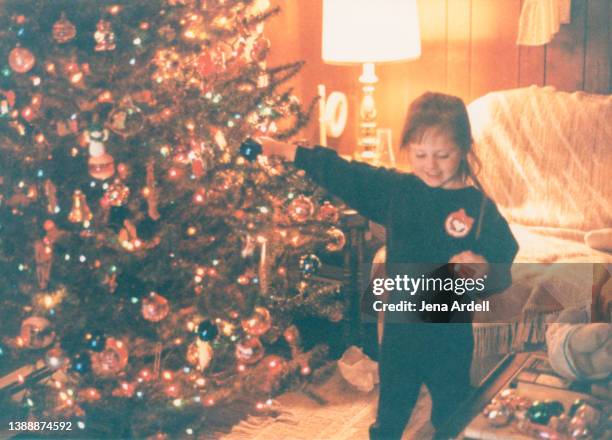 child christmas tree vintage 1980s 1990s childhood holiday family photo - christmas 1980 stock pictures, royalty-free photos & images