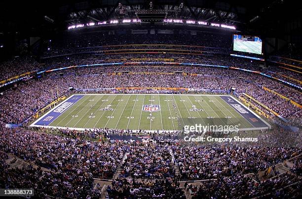 General view Stephen Gostkowski of the New England Patriots kicking off to start the game against the New York Giants during Super Bowl XLVI at Lucas...