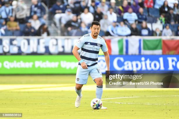 Roger Espinoza of Sporting Kansas City with the ball during a game between Real Salt Lake and Sporting Kansas City at Children's Mercy Park on March...