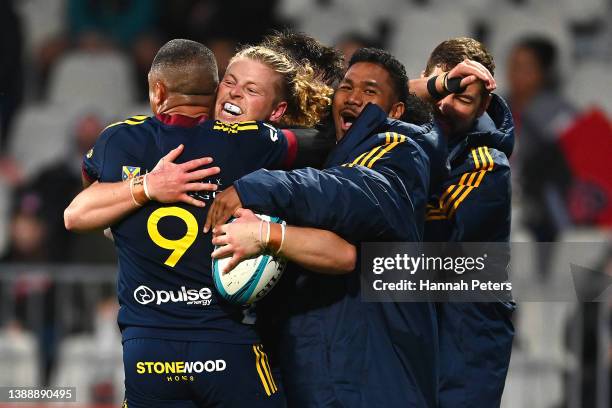 Scott Gregory of the Highlanders celebrates his try during the round seven Super Rugby Pacific match between the Crusaders and the Highlanders at...