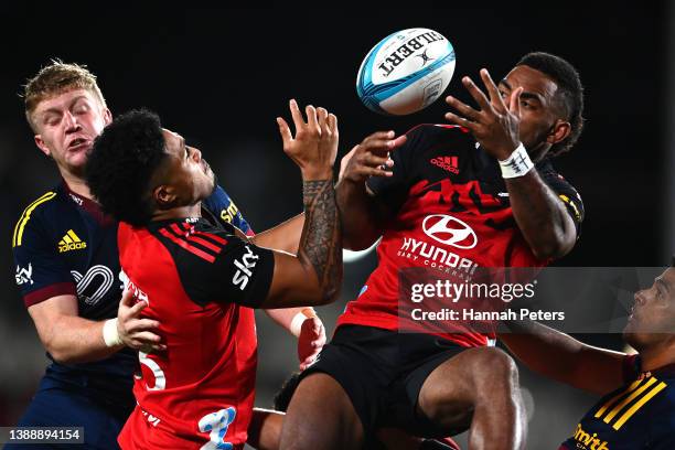 Sevu Reece and Leicester Fainga'anuku of the Crusaders get under the high ball during the round seven Super Rugby Pacific match between the Crusaders...