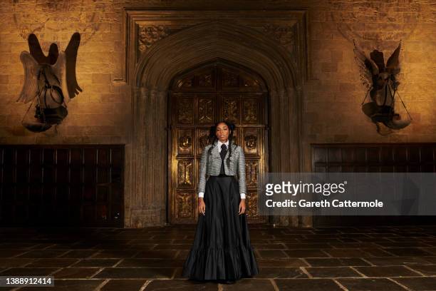 Jessica Williams attends a photocall for "Fantastic Beasts: The Secrets of Dumbledore" in the Great Hall at Warner Bros. Studio Tour London on March...