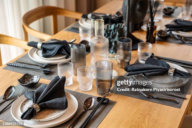 elegant table set up for dinning room - black tie dinner stock-fotos und bilder