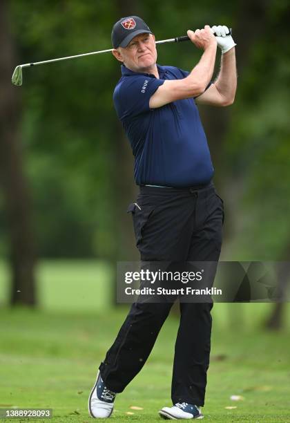 Roger Chapman of England plays his approach shot on the fifth hole during the first round of the MCB Tour Championship at Constance Belle Mare Plage...