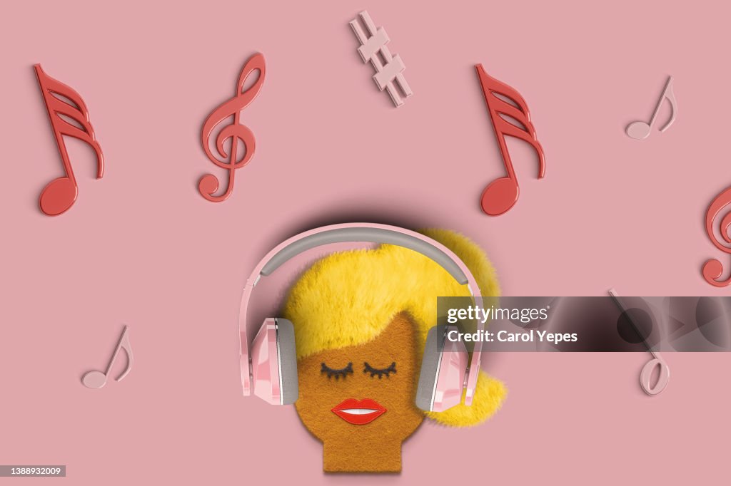 Female illustration listening music with headphones and musical notes in pink background