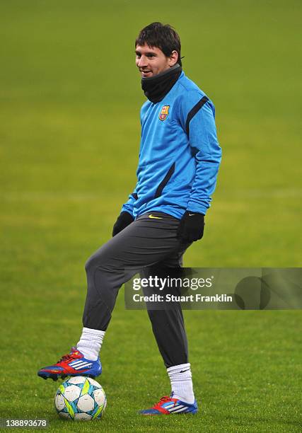 Lionel Messi of FC Barcelona looks happy during training at the BayArena on February 13, 2012 in Leverkusen, Germany.