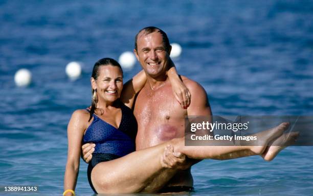 England spin bowler Phil Edmonds and wife Frances Edmonds pictured relaxing in the sea at Ocho Rios beach during the 1986 England Cricket Tour to the...