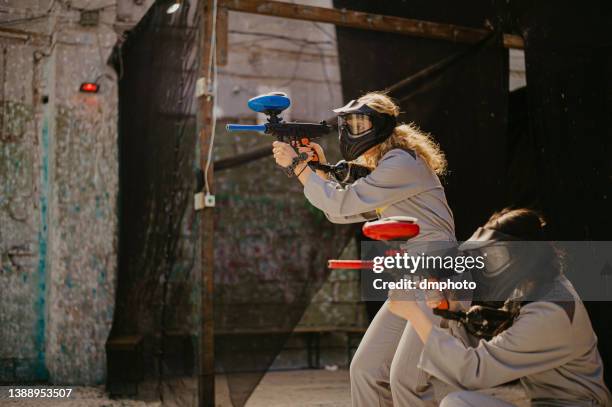 teamwork - paintball stock pictures, royalty-free photos & images