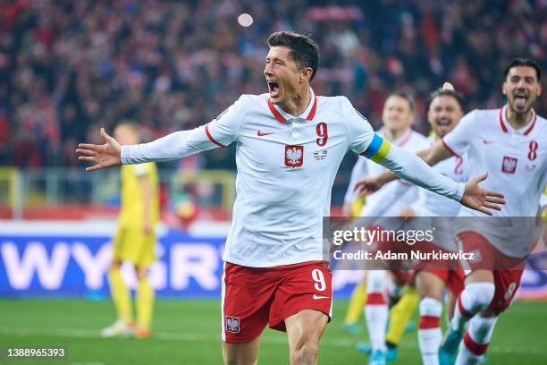 Robert Lewandowski from Poland celebrates with team mates after scoring during the 2022 FIFA World Cup Qualifier knockout round play-off match...