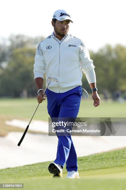 Hideki Matsuyama of Japan walks across the 14th green during the second round of the Valero Texas Open at TPC San Antonio on April 01, 2022 in San...