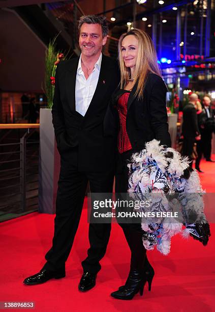British actor Ray Stevenson poses with girlfriend Elisabetta Caraccia as they arrive at the Premiere screening of the film "Jayne Mansfield's Car"...