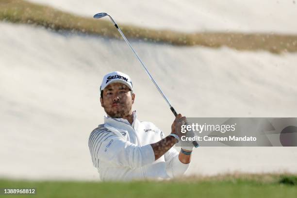 Hideki Matsuyama of Japan plays his shot from the bunker on the 15th hole during the second round of the Valero Texas Open at TPC San Antonio on...