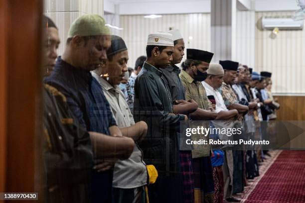 Indonesian Muslims Muhammadiyah perform the first Tarawih, marking the beginning of Ramadan at Baiturrahman mosque on April 01, 2022 in Surabaya,...