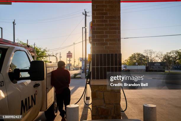 Person pumps gas at a Shell gas station on April 01, 2022 in Houston, Texas. The Biden administration announced Thursday that the U.S. Will release...