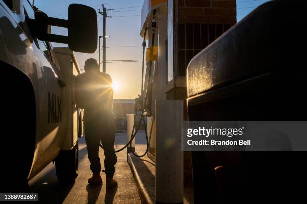 Person pumps gas at a Shell gas station on April 01, 2022 in Houston, Texas. The Biden administration announced Thursday that the U.S. Will release...