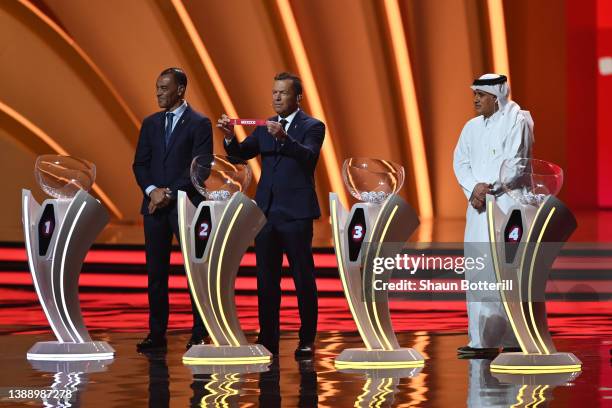 Lothar Matthaus draws the card of Mexico in Group C during the FIFA World Cup Qatar 2022 Final Draw at the Doha Exhibition Center on April 01, 2022...