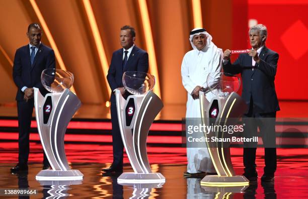 Bora Milutinovic draws the card of IC Play-off 1 in Group D during the FIFA World Cup Qatar 2022 Final Draw at the Doha Exhibition Center on April...