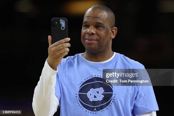 Head coach Hubert Davis of the North Carolina Tar Heels looks on during practice before the 2022 Men's Basketball Tournament Final Four at Caesars...