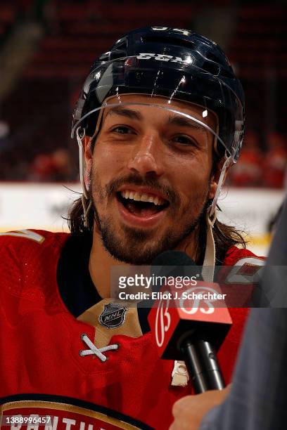 Ryan Lomberg of the Florida Panthers chats with Bally Sports network during warm ups prior to the start of the game against the Chicago Blackhawks at...