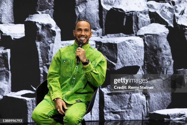 Lewis Hamilton speaks during the Signature talk “Being a Pilot” with Valentino Rossi at the IWC Schaffhausen booth at Watches and Wonders 2022 on...