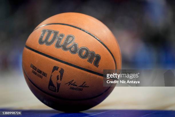 The NBA logo is pictured on a Wilson brand basketball during the game between the Detroit Pistons and Philadelphia 76ers Little Caesars Arena on...