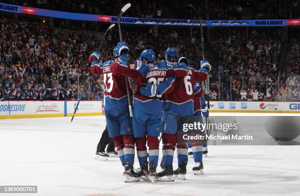 Members of the Colorado Avalanche celebrate a goal against the San Jose Sharks at Ball Arena on March 31, 2022 in Denver, Colorado.