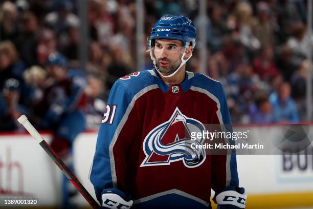 Nazem Kadri of the Colorado Avalanche looks on during a pause in play against the San Jose Sharks at Ball Arena on March 31, 2022 in Denver, Colorado.
