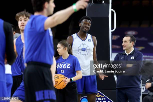 Head coach Mike Krzyzewski of the Duke Blue Devils talks to player Mark Williams during practice before the 2022 Men's Basketball Tournament Final...