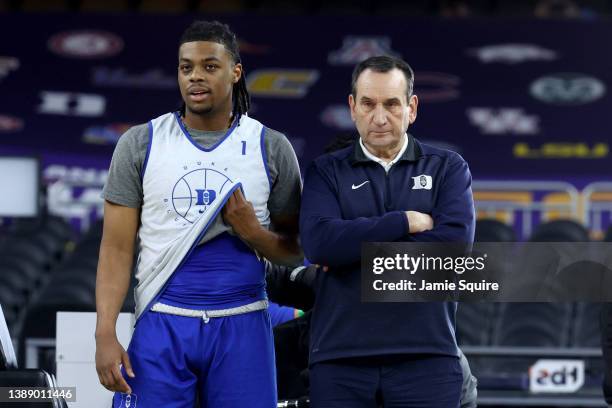 Head coach Mike Krzyzewski of the Duke Blue Devils stands with player Trevor Keels during practice before the 2022 Men's Basketball Tournament Final...