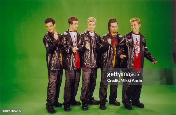 Members of the American Pop group N'Sync pose in front of a green screen during a publicity photoshoot, Boston, Massachusetts, 1998. Pictured are,...