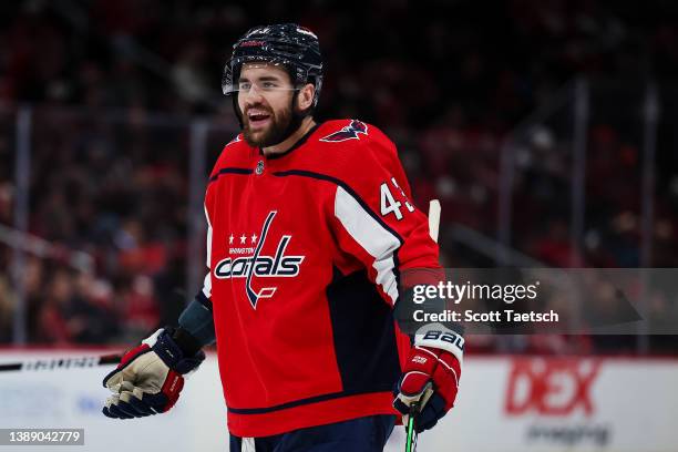 Tom Wilson of the Washington Capitals reacts to a call during the third period of the game against the Carolina Hurricanes at Capital One Arena on...