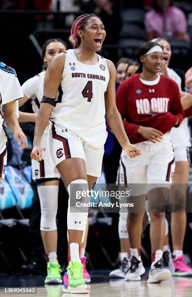 Aliyah Boston of the South Carolina Gamecocks celebrates in the second half against the Louisville Cardinals during the 2022 NCAA Women's Final Four...