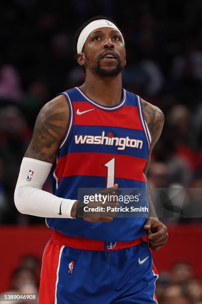 Kentavious Caldwell-Pope of the Washington Wizards reacts against the Dallas Mavericks during the second half at Capital One Arena on April 01, 2022...