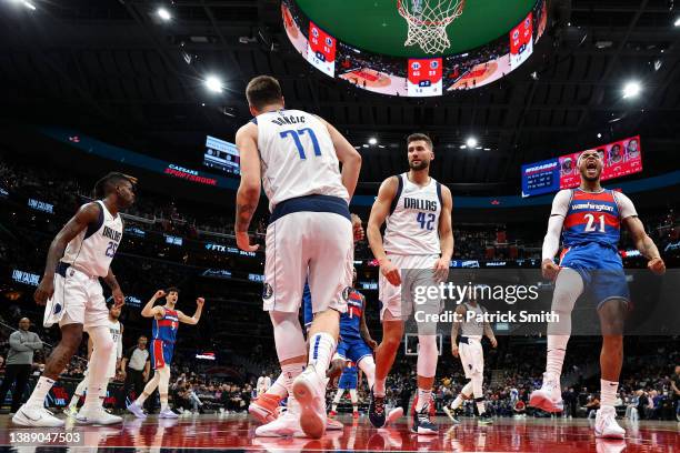 Daniel Gafford of the Washington Wizards reacts after dunking against the Dallas Mavericks during the first half at Capital One Arena on April 01,...