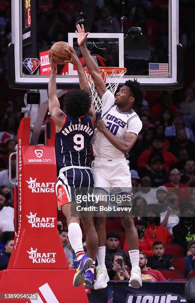 Josh Christopher of the Houston Rockets has his shot blocked by Damian Jones of the Sacramento Kings during the fourth quarter at Toyota Center on...