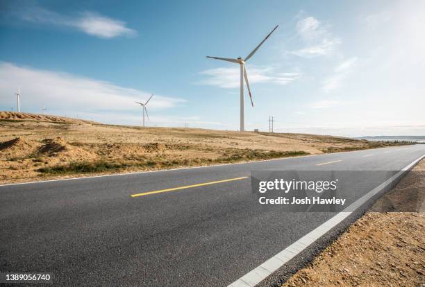 wind power and road - wind farm australia fotografías e imágenes de stock