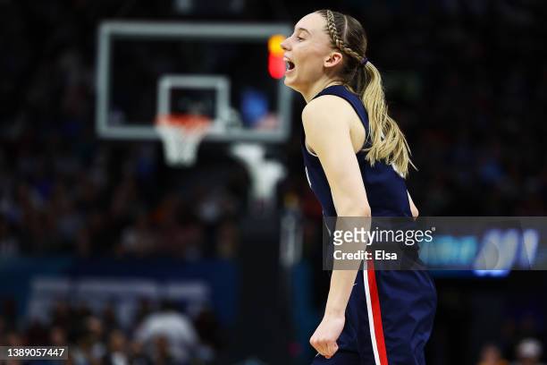 Paige Bueckers of the UConn Huskies reacts in the fourth quarter against the Stanford Cardinal during the 2022 NCAA Women's Final Four semifinal game...