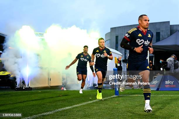 Aaron Smith of the Highlanders leads his team out ahead of the round seven Super Rugby Pacific match between the Crusaders and the Highlanders at...