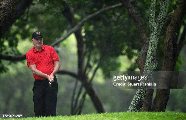 Roger Chapman of England plays an approach shot during the continuation of the wether delayed first round of the MCB Tour Championship at Constance...
