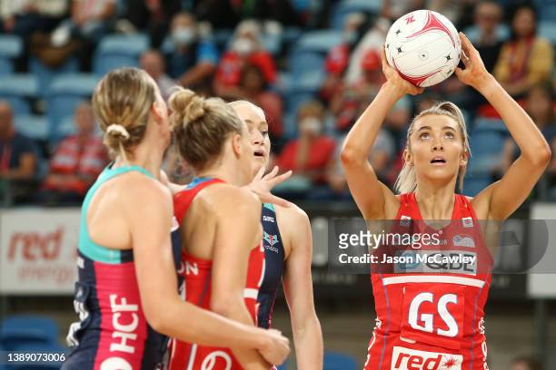 Helen Housby of the Swifts shoots during the round two Super Netball match between Sydney Swifts and Melbourne Vixens at Ken Rosewall Arena on April...