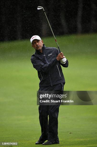 Jeev Milkha Singh of India plays an approach shot during the continuation of the wether delayed first round of the MCB Tour Championship at Constance...