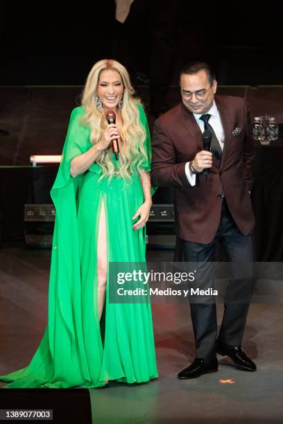 Special guest Yuri and Gilberto Santa Rosa perform during a concert at Auditorio Nacional on April 1, 2022 in Mexico City, Mexico.