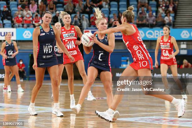 Kate Moloney of the Vixens looks to pass during the round two Super Netball match between Sydney Swifts and Melbourne Vixens at Ken Rosewall Arena on...